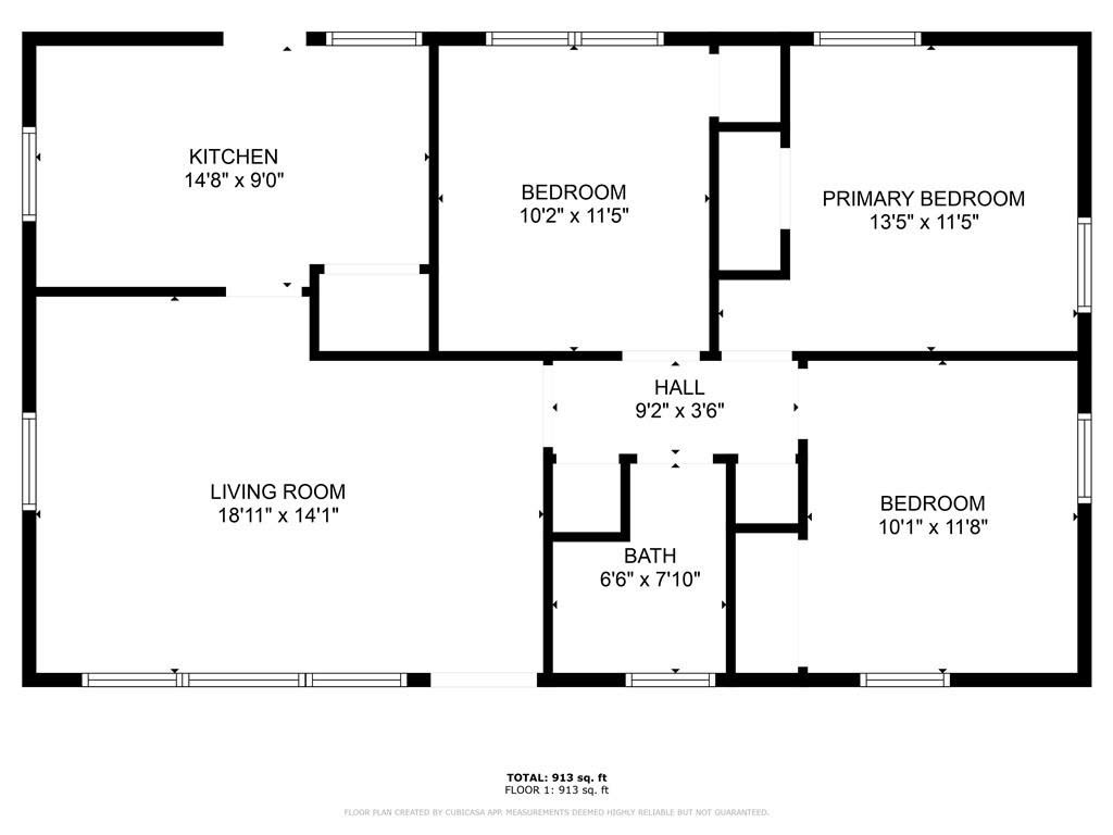 Floor plan: living room, kitchen, three bedrooms, one bath and a hall
