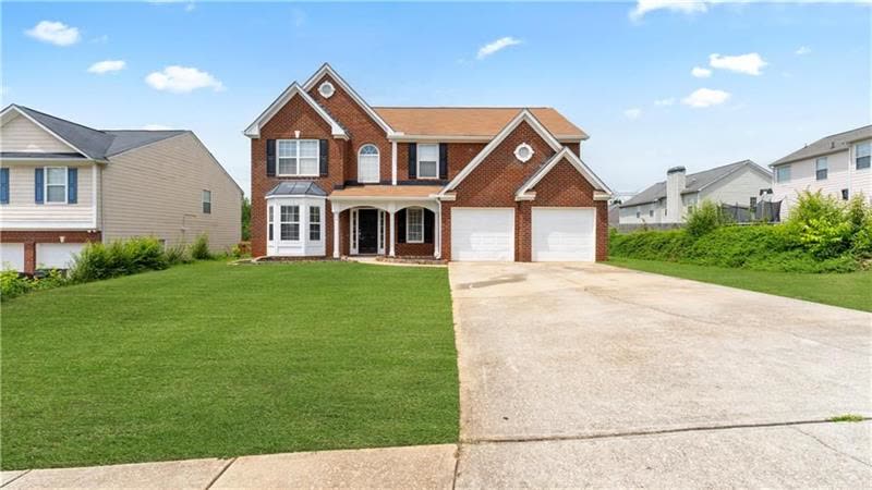 Front of the house, with the two-car garage